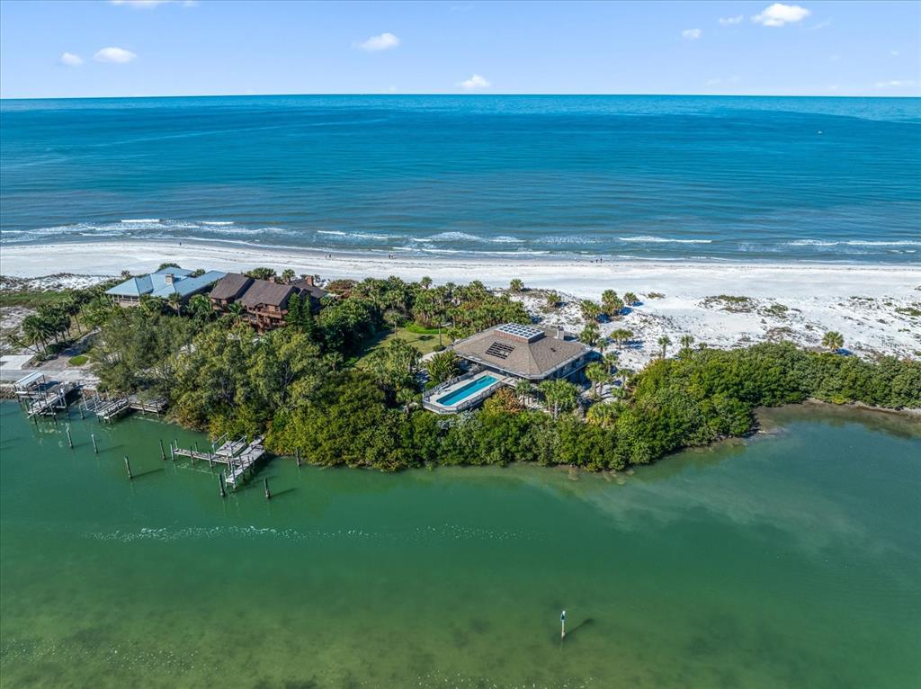 1198 Mandalay Point Road Clearwater, FL 33767 - Photo 56 of 61 a view of a backyard with a garden