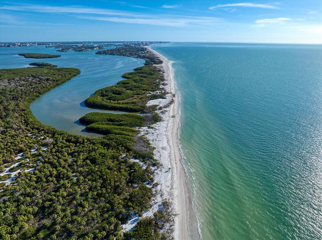 1198 Mandalay Point Road Clearwater, FL 33767 - Photo 57 of 61 a view of a lake with a outdoor space