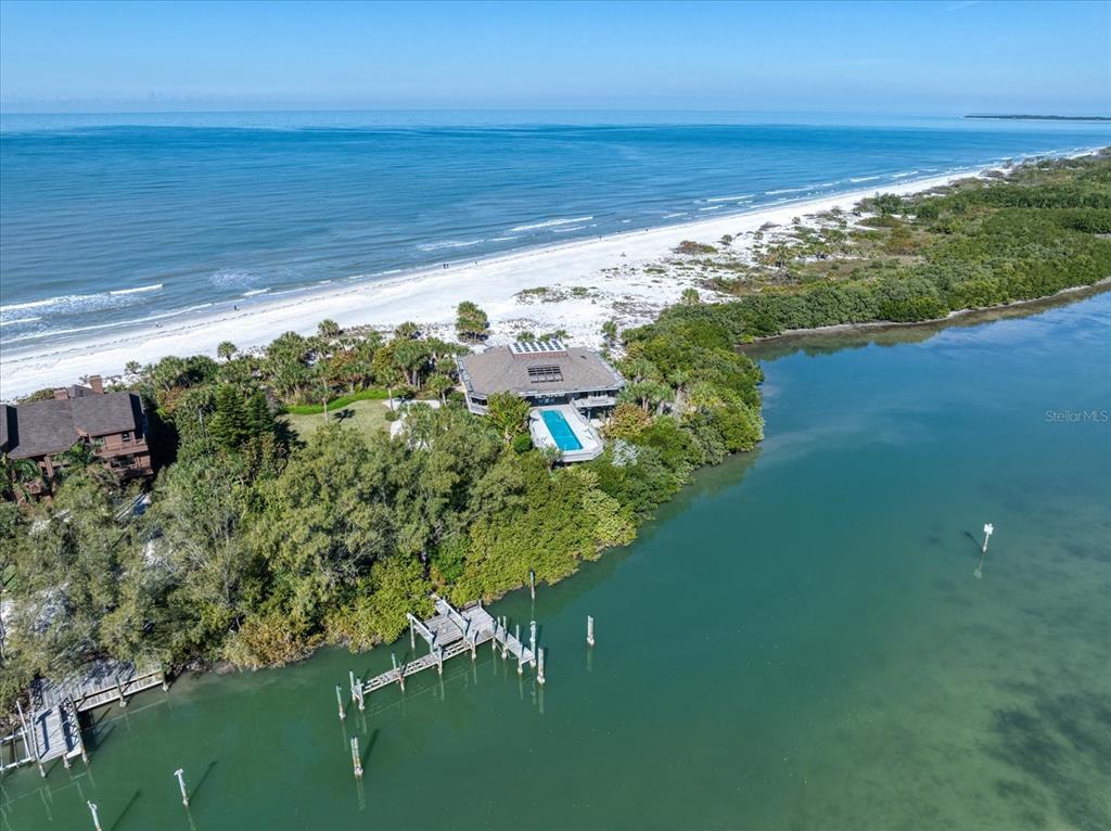 1198 Mandalay Point Road Clearwater, FL 33767 - Photo 10 of 61 a view of a lake with a yard