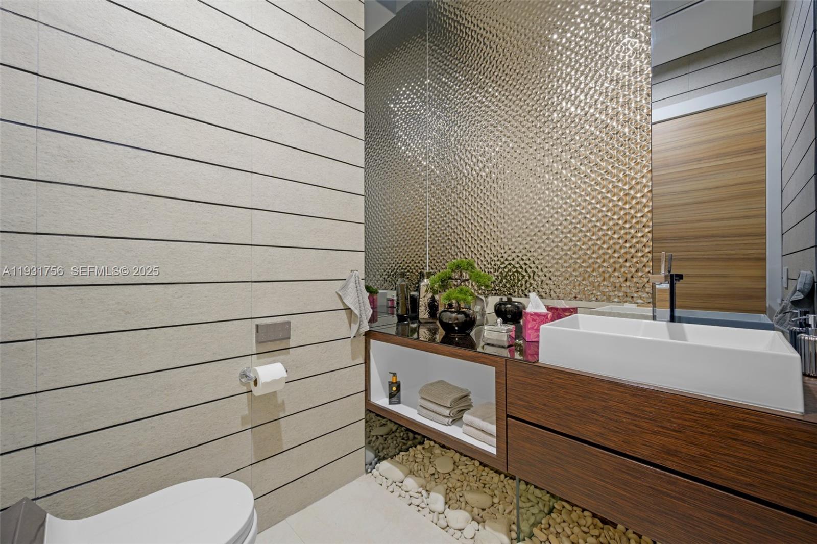 3260 Northeast 165th Street North Miami Beach, FL 33160 - Photo 15 of 43 a bathroom with a toilet and a sink