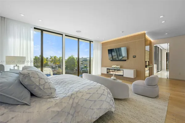 a living room with furniture or couch and a flat screen tv