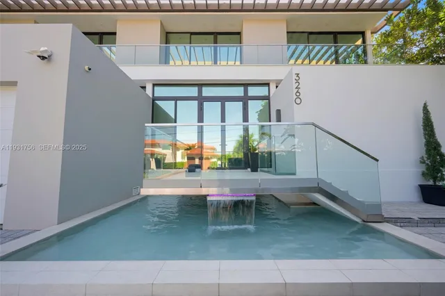 a view of outdoor space yard deck patio and swimming pool