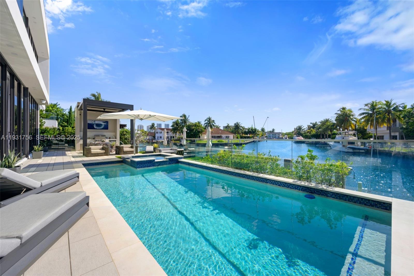 3260 Northeast 165th Street North Miami Beach, FL 33160 - Photo 36 of 43 a view of swimming pool from a terrace