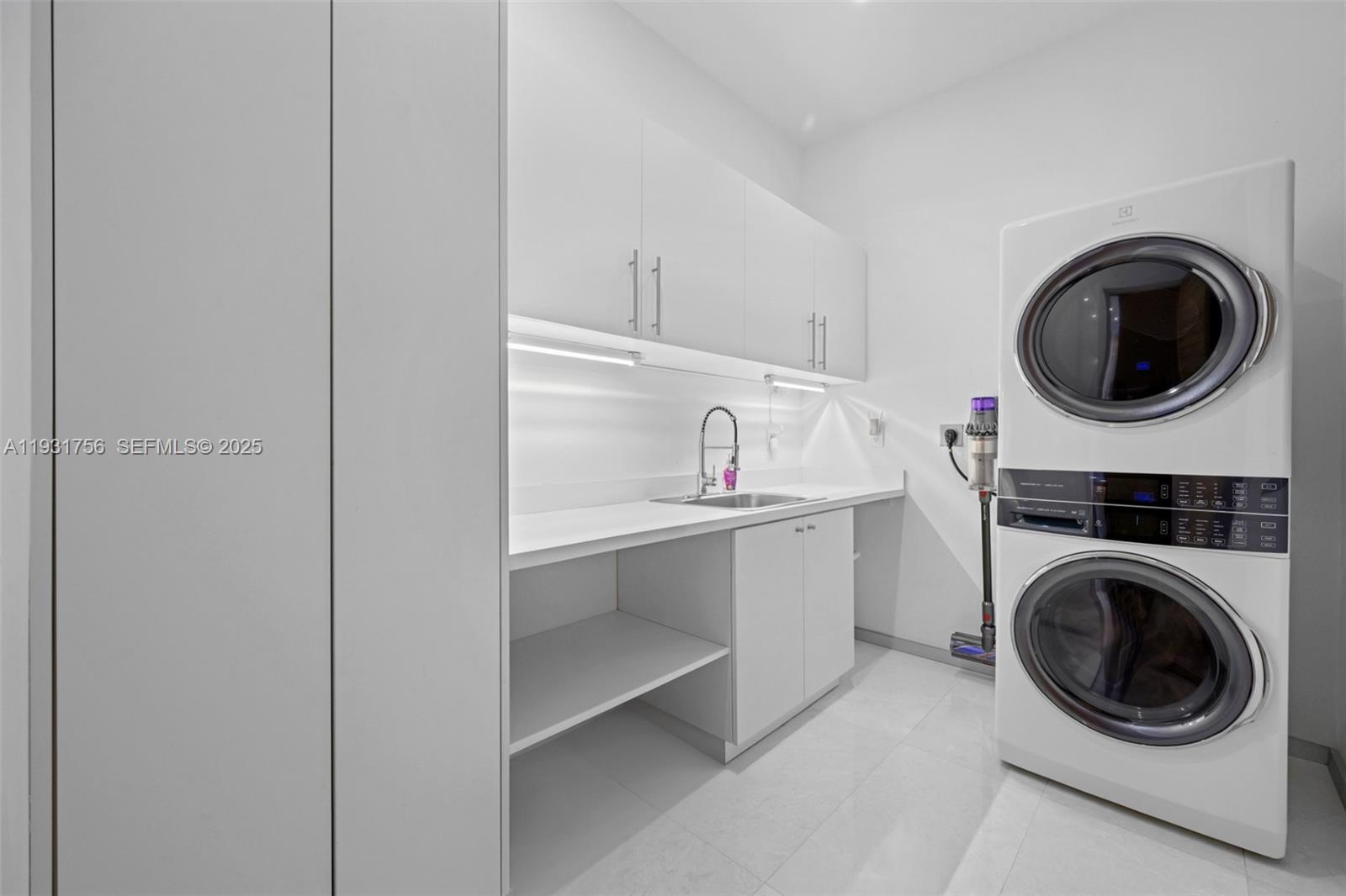 3260 Northeast 165th Street North Miami Beach, FL 33160 - Photo 42 of 43 a utility room with sink dryer and washer