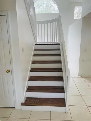 a view of entryway with stairs