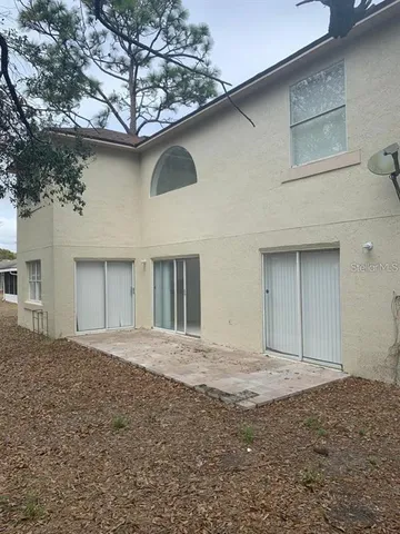a view of a backyard of a house