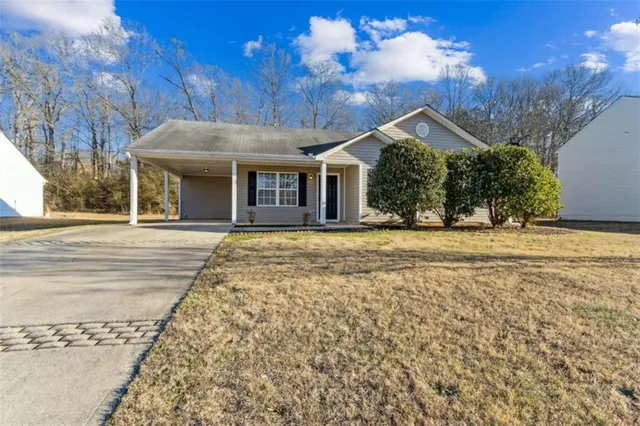a front view of house with yard