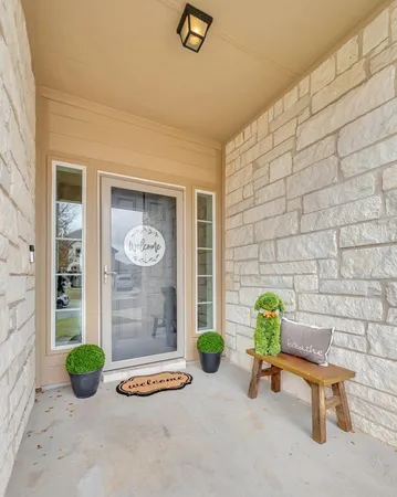 a kitchen with stainless steel appliances granite countertop a refrigerator sink and stove