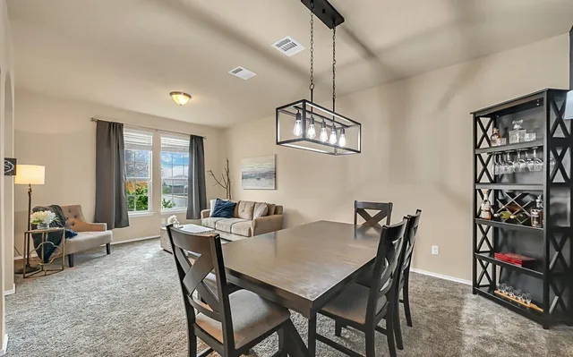 a bathroom with a sink toilet vanity and shower