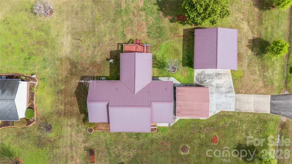 a aerial view of a house with a big yard