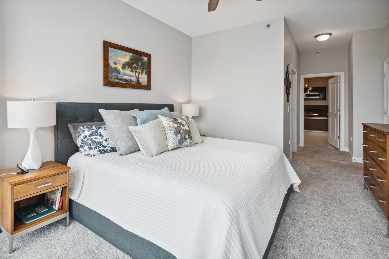 1211 South Prairie Avenue, Unit 606 Chicago, IL 60605 - Photo 17 of 44 a spacious bedroom with a bed and a couch