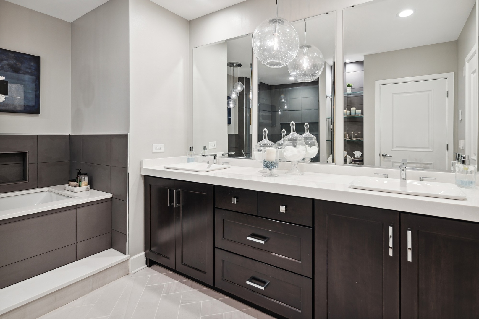 1211 South Prairie Avenue, Unit 606 Chicago, IL 60605 - Photo 21 of 44 a bathroom with a sink double vanity and a mirror