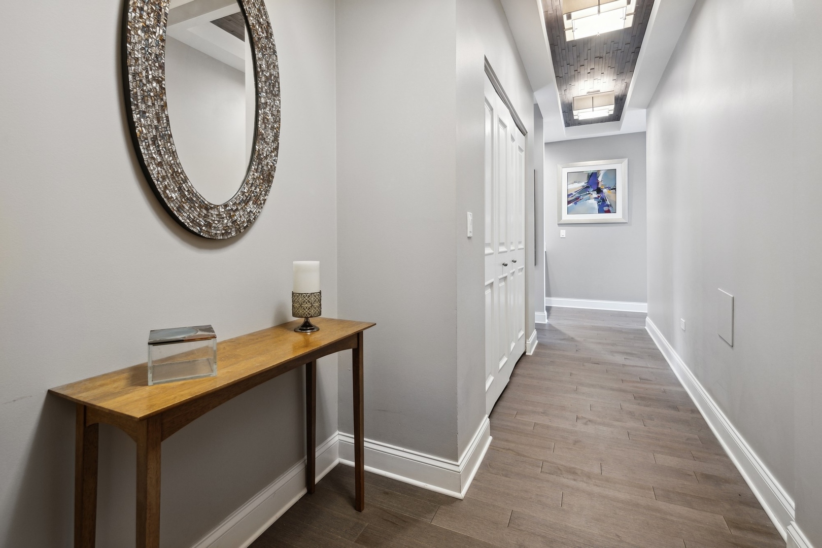 1211 South Prairie Avenue, Unit 606 Chicago, IL 60605 - Photo 24 of 44 a view of a hallway with washer and dryer