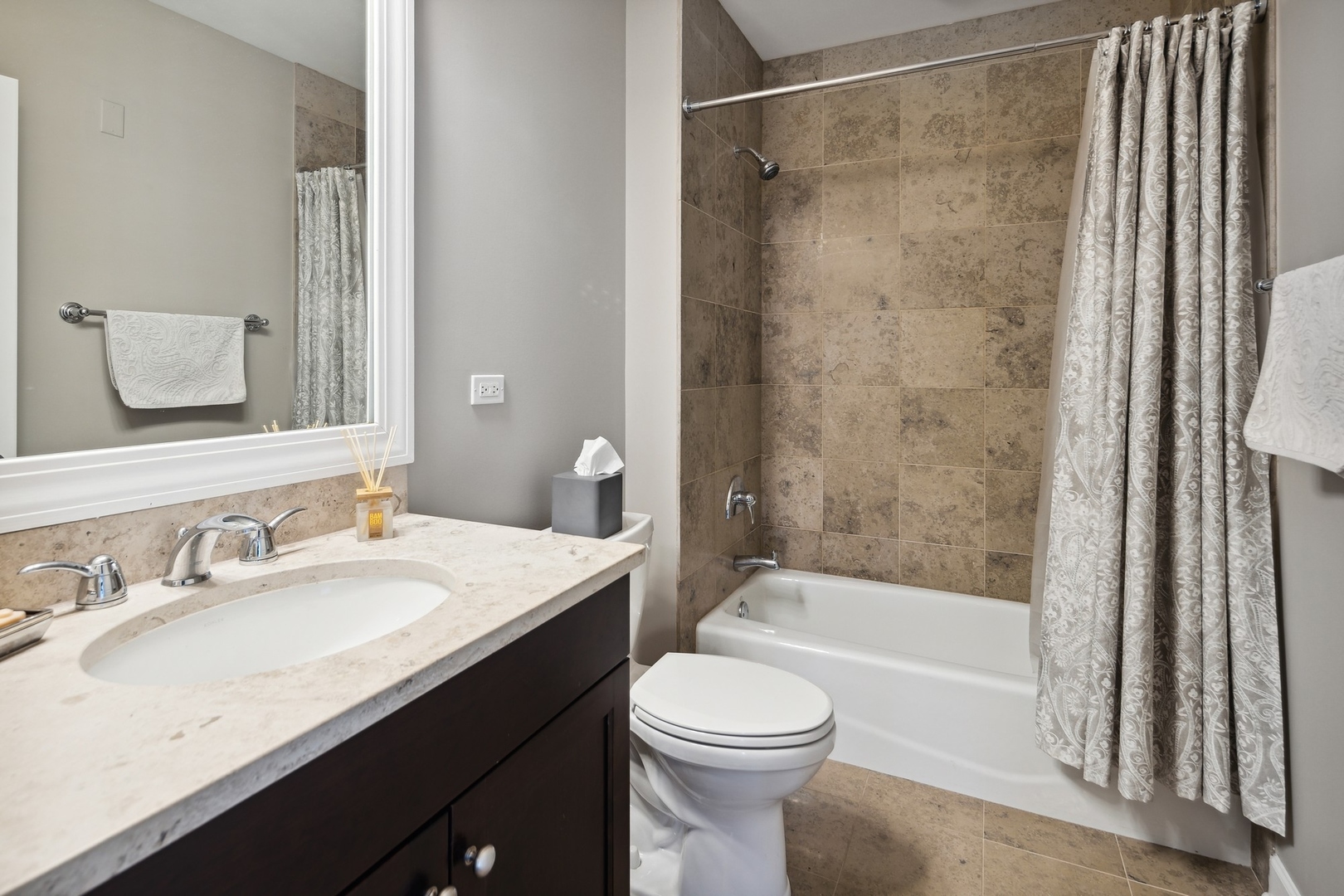 1211 South Prairie Avenue, Unit 606 Chicago, IL 60605 - Photo 25 of 44 a bathroom with a granite countertop sink toilet and shower