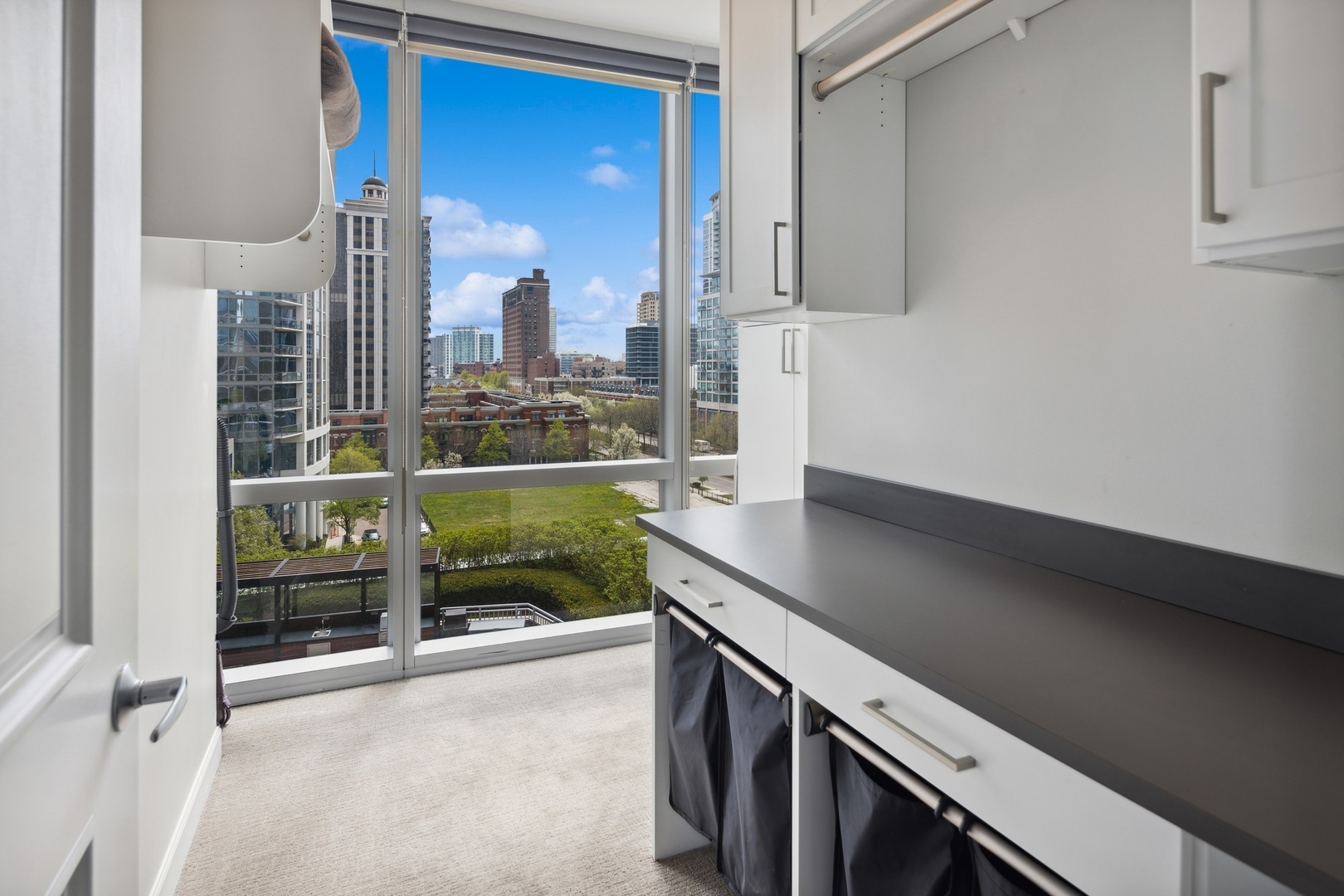1211 South Prairie Avenue, Unit 606 Chicago, IL 60605 - Photo 27 of 44 a view of a kitchen with a sink and a window
