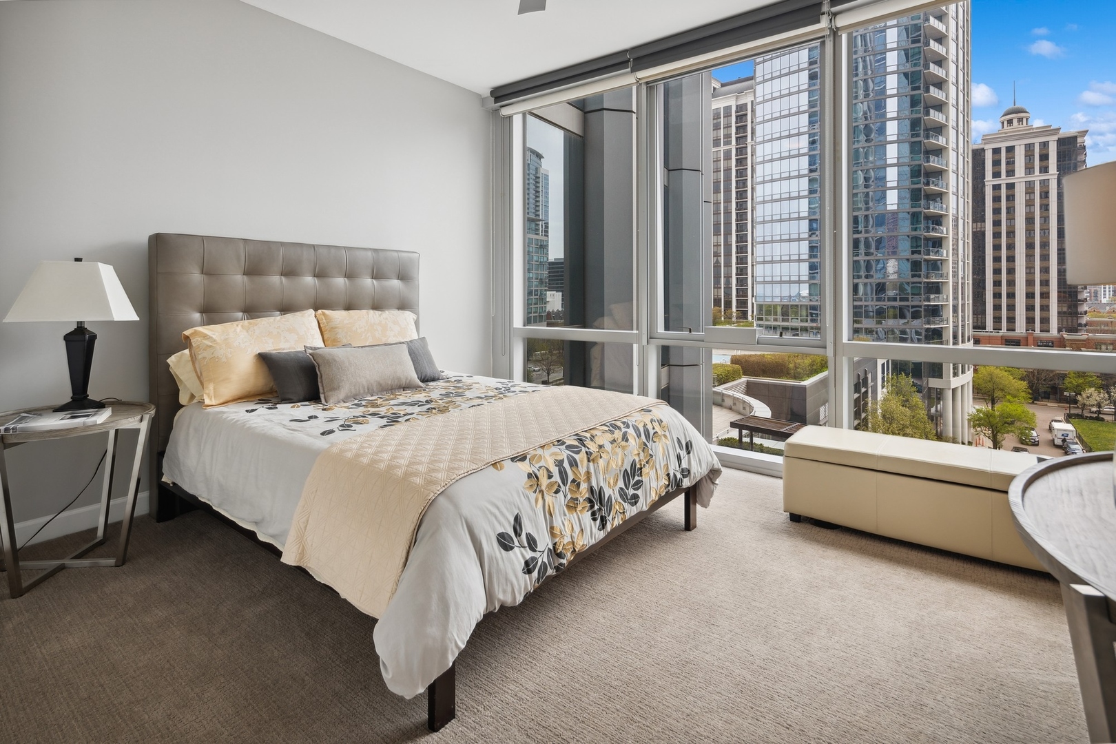 1211 South Prairie Avenue, Unit 606 Chicago, IL 60605 - Photo 29 of 44 a bed room with a bed and a couch