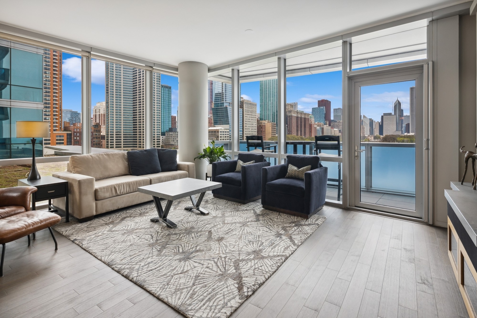 1211 South Prairie Avenue, Unit 606 Chicago, IL 60605 - Photo 7 of 44 a living room with furniture and a large window