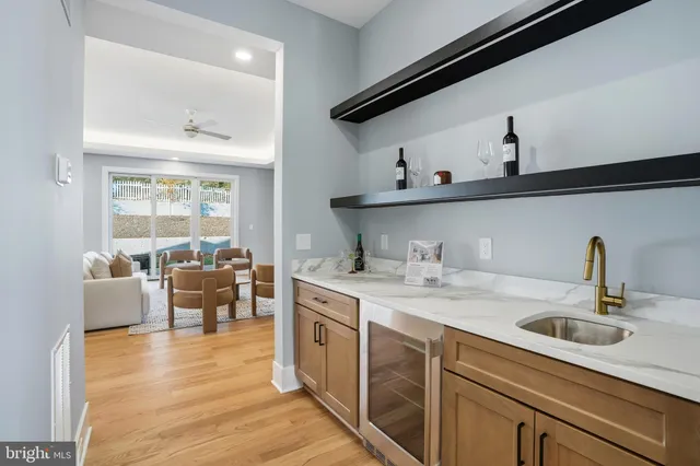 a large kitchen with stainless steel appliances kitchen island granite countertop a large counter top and stove