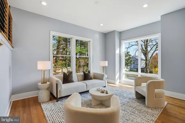 a kitchen with granite countertop a sink a counter space cabinets and stainless steel appliances