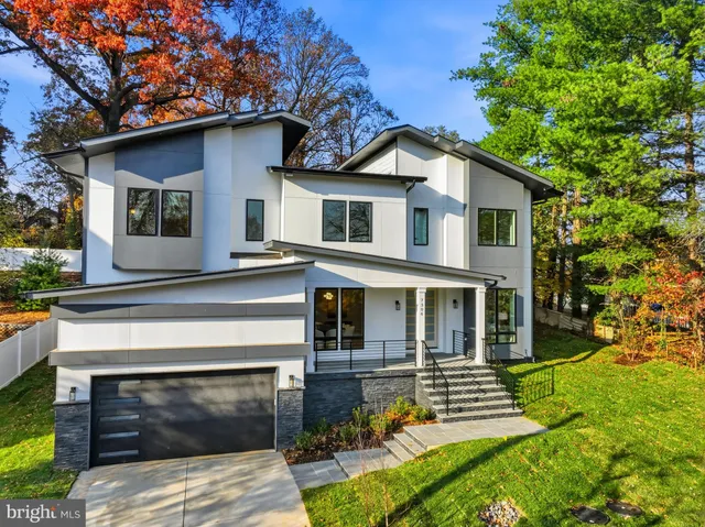 a front view of a house with a porch