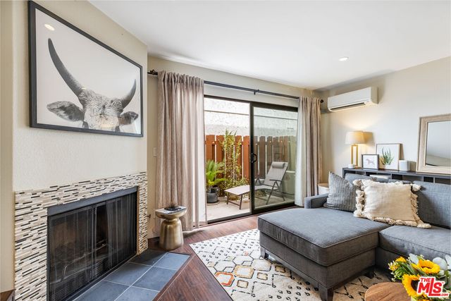 a bathroom with a sink vanity granite and a mirror
