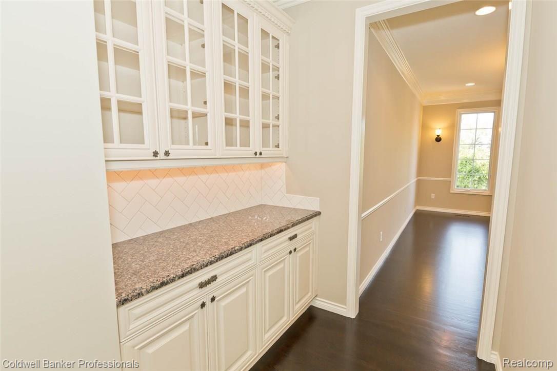 5329 Keswick Court Rochester, MI 48306 - Photo 25 of 64 Butlers pantry with access to dining room.