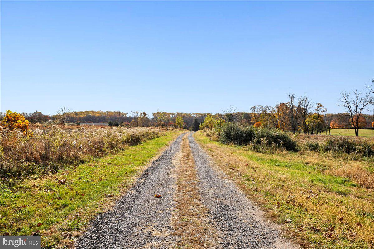 6859 Phillips Mill Road New Hope, PA 18938 - Photo 11 of 18 a view of a dry yard with wooden fence