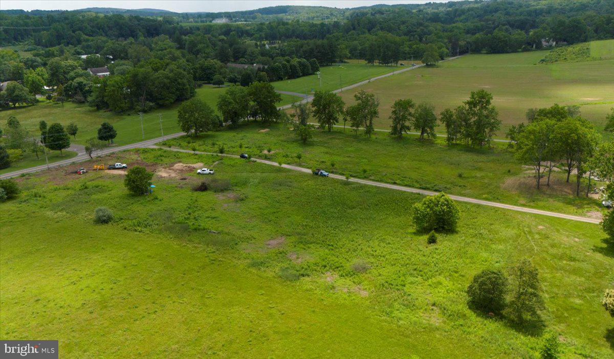 6859 Phillips Mill Road New Hope, PA 18938 - Photo 16 of 18 a view of a golf course with a lake