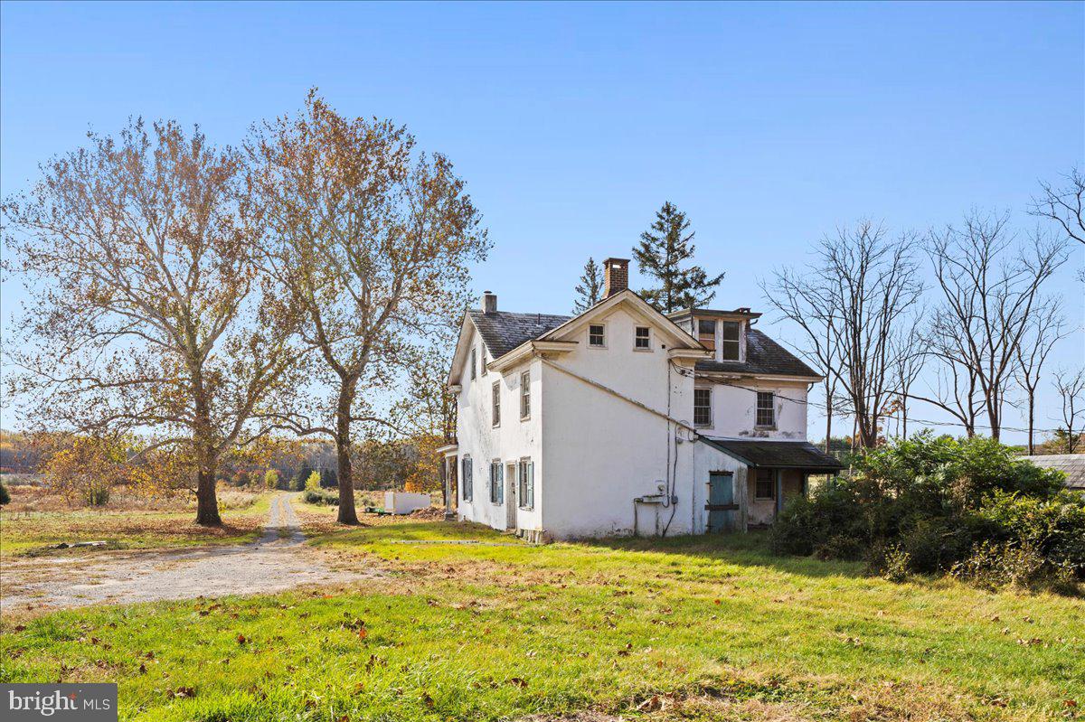 6859 Phillips Mill Road New Hope, PA 18938 - Photo 6 of 18 a house that has a tree in front of it