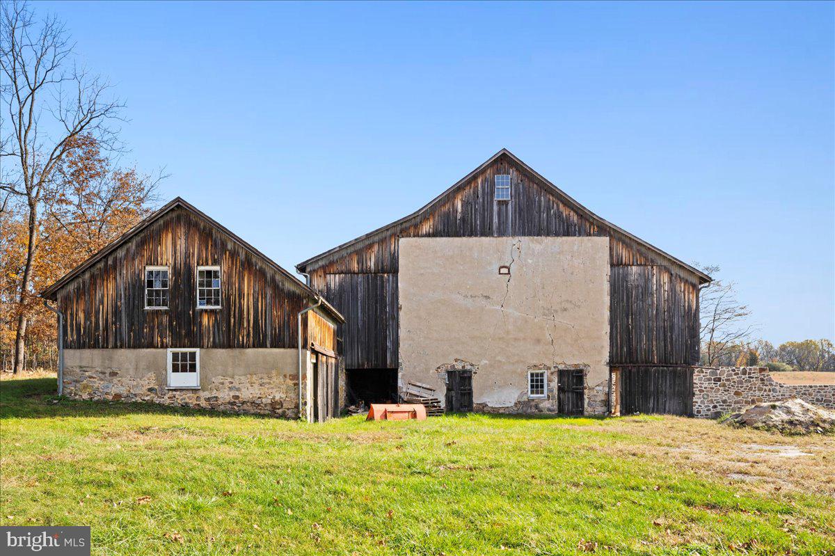 6859 Phillips Mill Road New Hope, PA 18938 - Photo 8 of 18 a house view with a outdoor space