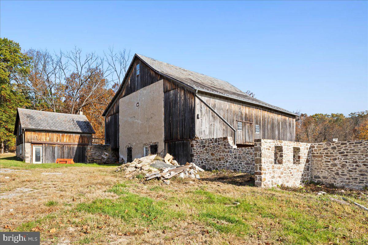 6859 Phillips Mill Road New Hope, PA 18938 - Photo 9 of 18 a view of a house with a yard