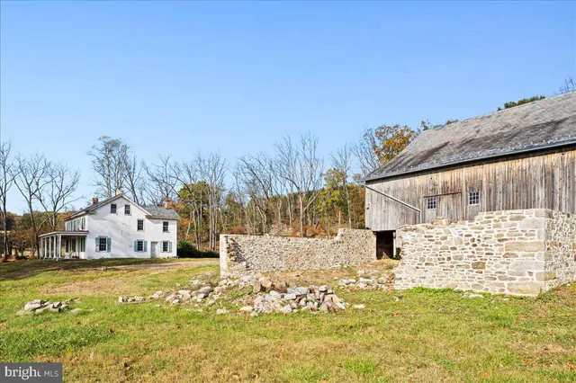 a view of a house with snow on the ground