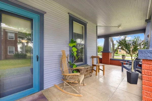 a building outdoor space with patio furniture