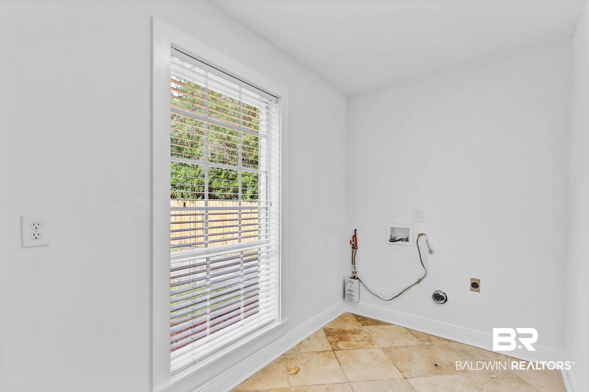 4705 Sherry Court Mobile, AL 36693 - Photo 31 of 100 Washroom with washer hookup, hookup for an electric dryer, and light tile patterned flooring