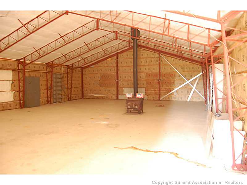 856 Sheep Ridge Road Fairplay, CO 80440 - Photo 5 of 18 Other. barn interior