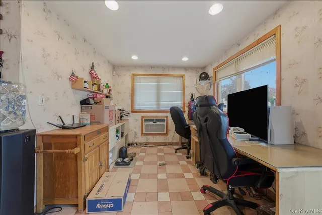 a view of a workspace with furniture