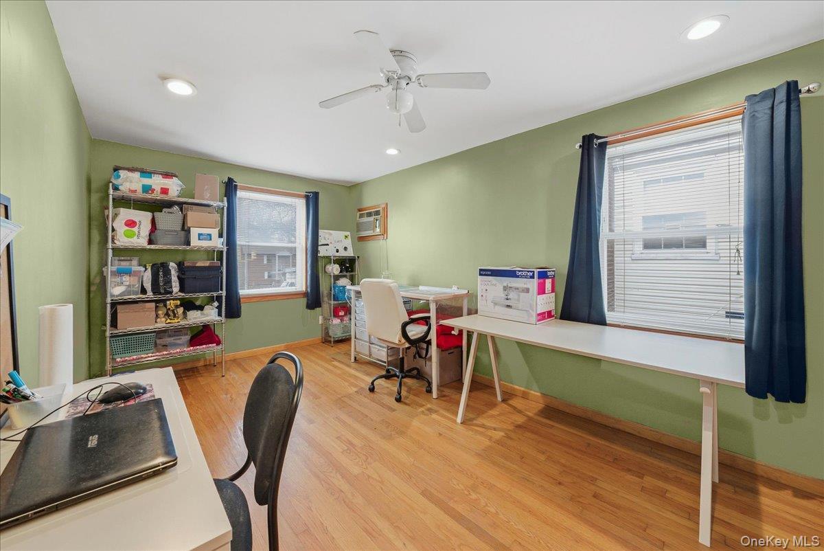 47-23 164th Street Queens, NY 11358 - Photo 22 of 47 a living room with furniture and a wooden floor