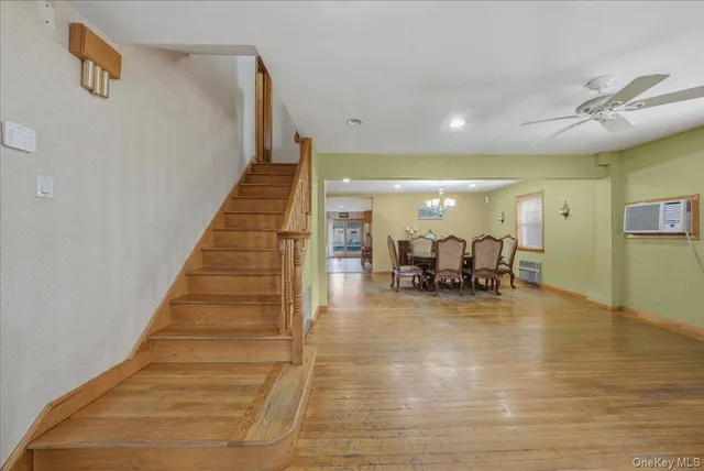 a view of a hall way with furniture