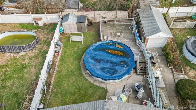 aerial view of a house with a swimming pool