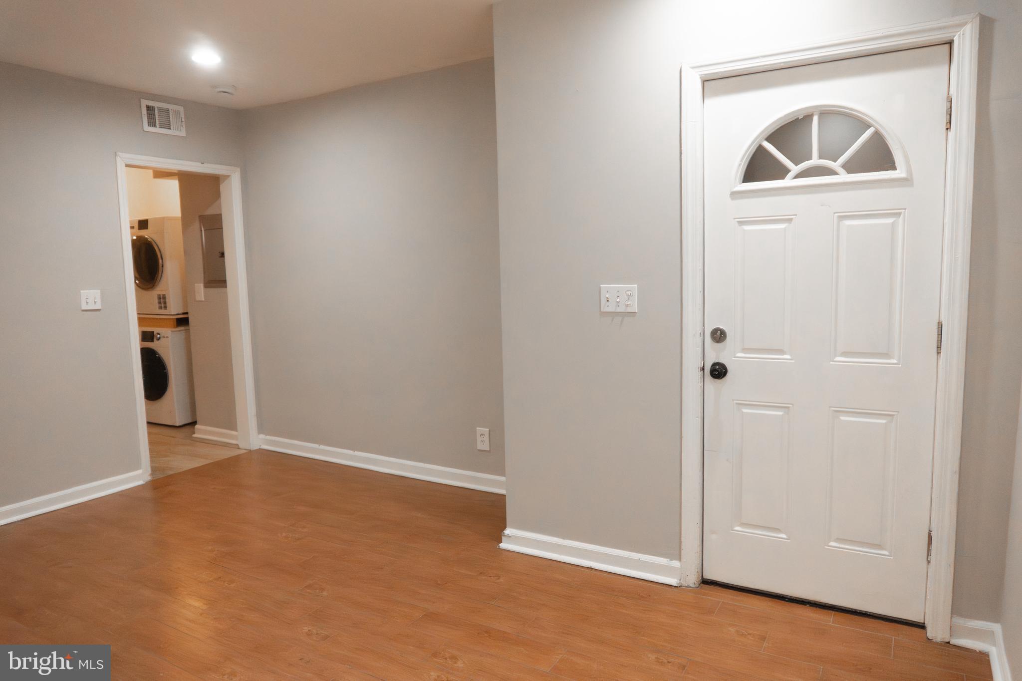 an empty room and closet area