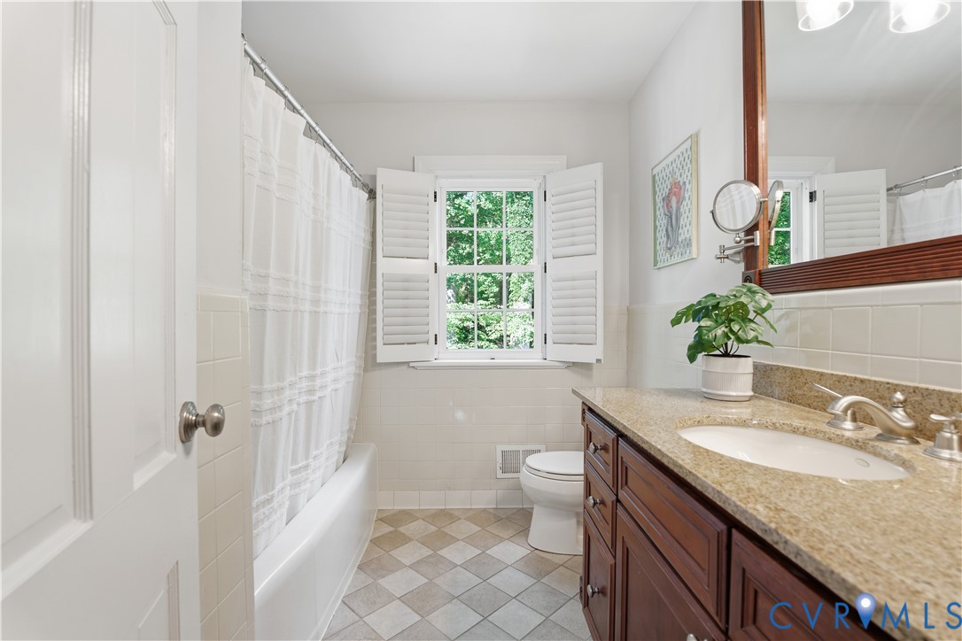 6405 Buckhill Road Richmond, VA 23225 - Photo 26 of 71 Bathroom featuring a dark wood-finish vanity with
