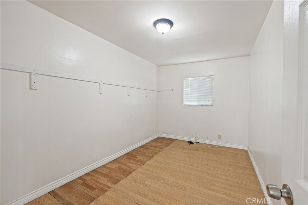 4761 West 141st Street Hawthorne, CA 90250 - Photo 20 of 29 a view of a room with racks on the wall
