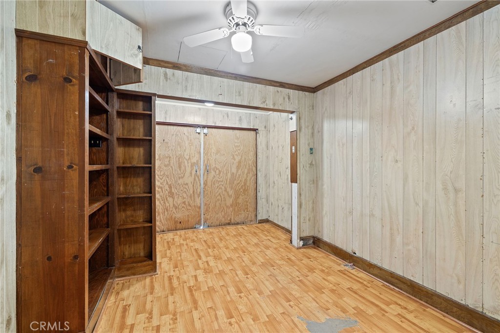 4761 West 141st Street Hawthorne, CA 90250 - Photo 26 of 29 a view of empty room with a ceiling fan and wooden floor