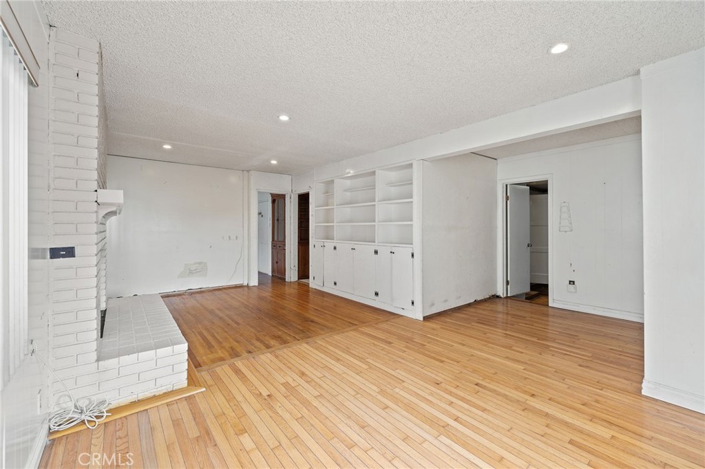 4761 West 141st Street Hawthorne, CA 90250 - Photo 3 of 29 a view of an empty room with wooden floor