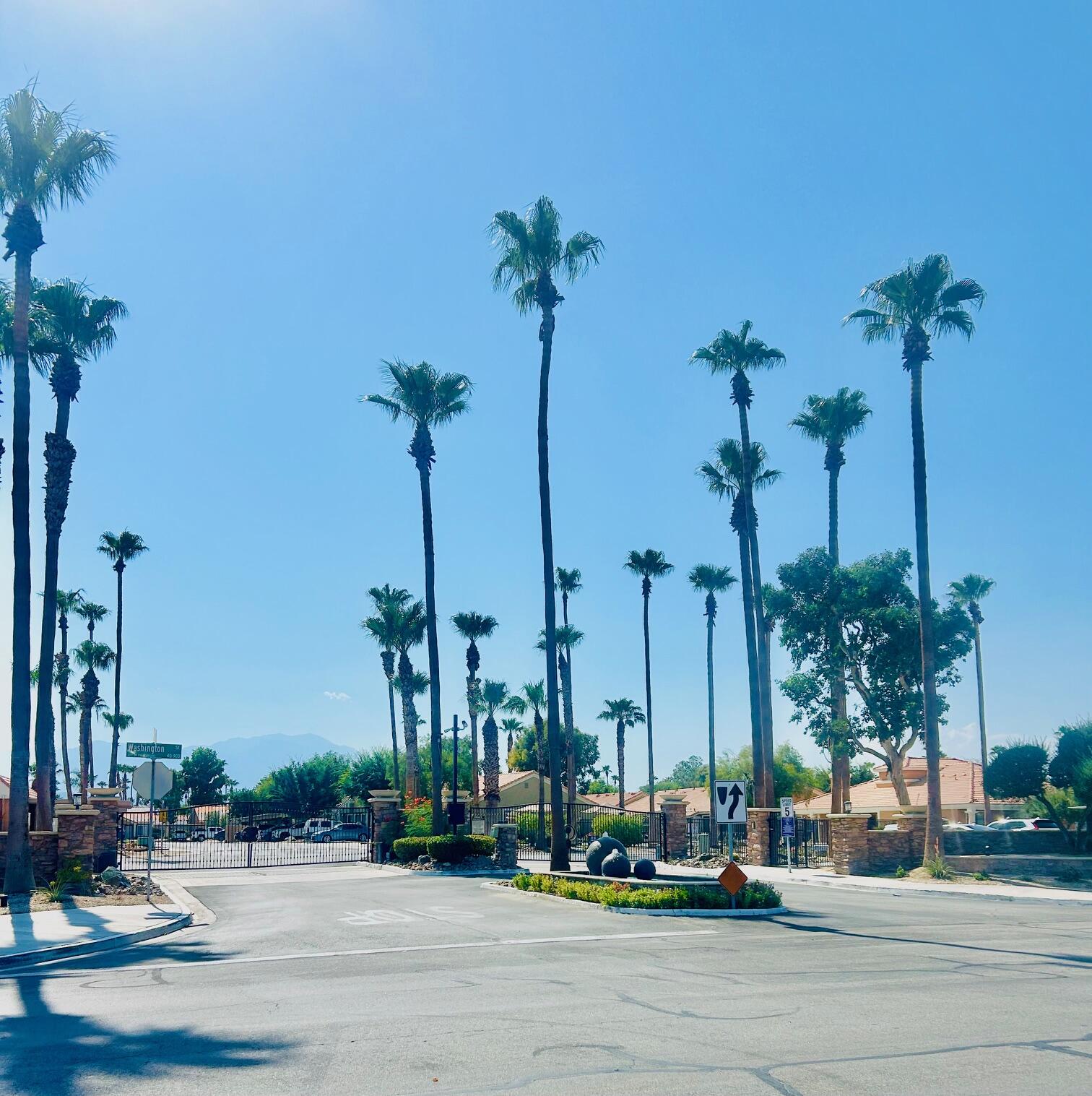 40780 Breezy Pass Road, Unit B Palm Desert, CA 92211 - Photo 2 of 32 a view of a city with tall buildings