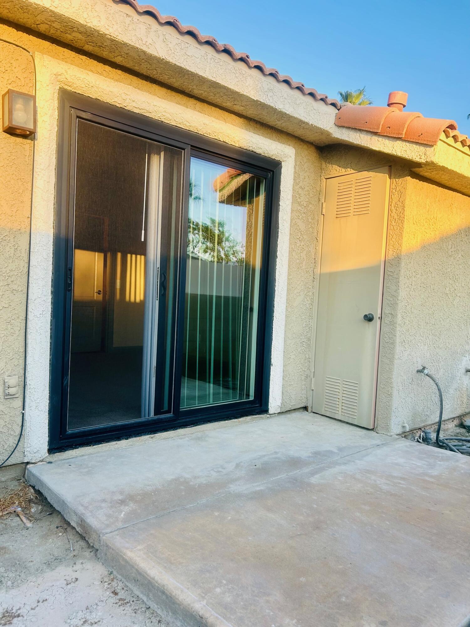 40780 Breezy Pass Road, Unit B Palm Desert, CA 92211 - Photo 29 of 32 a view of a front door