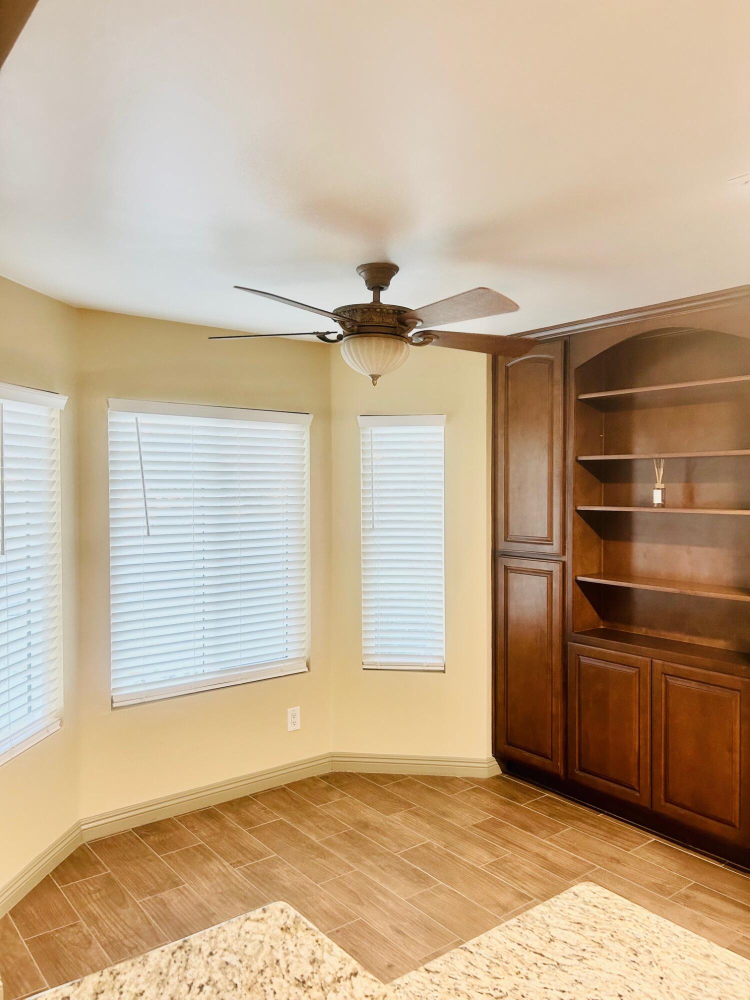 40780 Breezy Pass Road, Unit B Palm Desert, CA 92211 - Photo 4 of 32 a view of an empty room with a window
