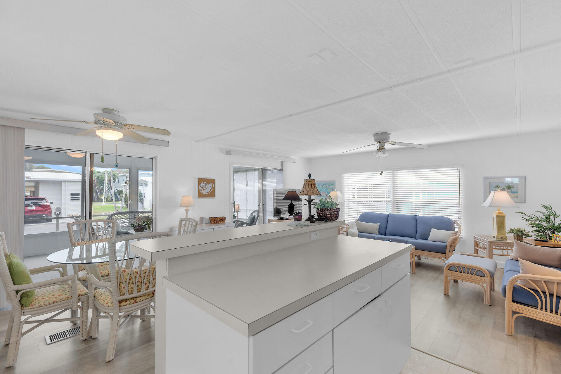 812 South Silver Circle Key Largo, FL 33037 - Photo 9 of 41 a living room with furniture and a large window