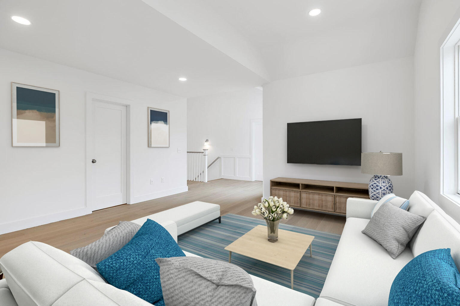 66 Doane Road Harwich Port, MA 02646 - Photo 14 of 40 a living room with couches and a flat screen tv