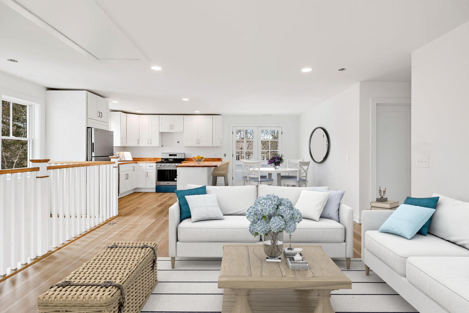 66 Doane Road Harwich Port, MA 02646 - Photo 23 of 40 a living room with furniture kitchen view and a large window